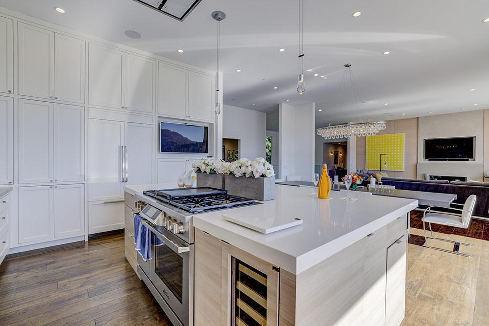 Gleaming white kitchen with island